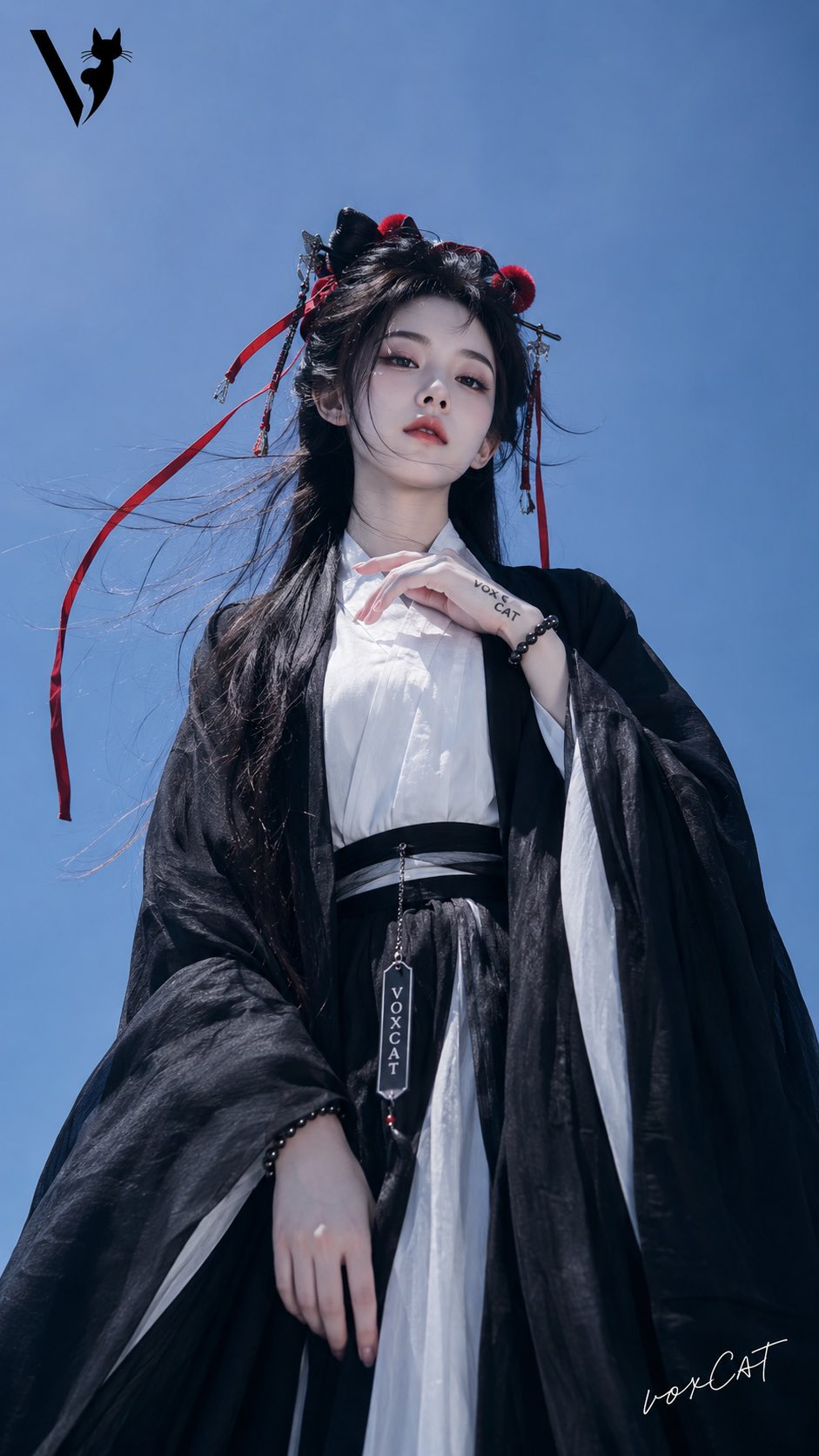 自定义角色,年轻成年东方女性,清冷古风汉服外景写真风格,黑色长发,高髻与披发结合,头顶佩戴红色毛球发饰与古风发簪,两侧垂