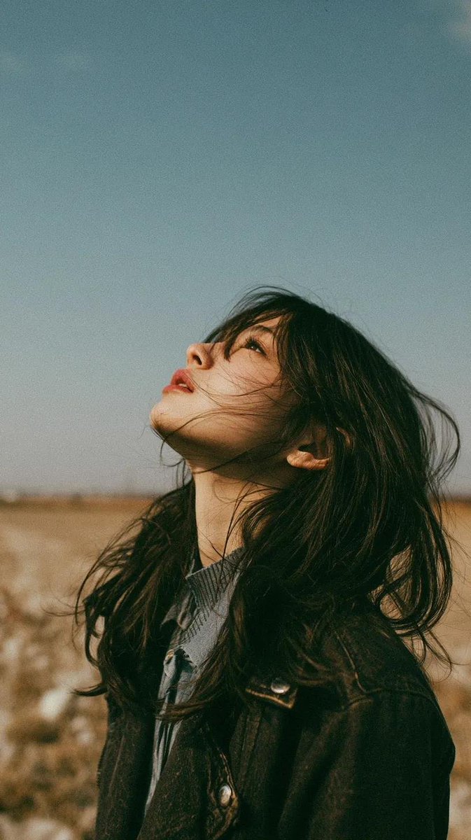 Cinematic minimalist portrait of a beautiful young East Asia