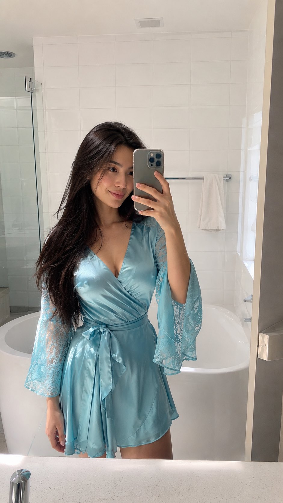 Photorealistic vertical smartphone mirror selfie of an adult