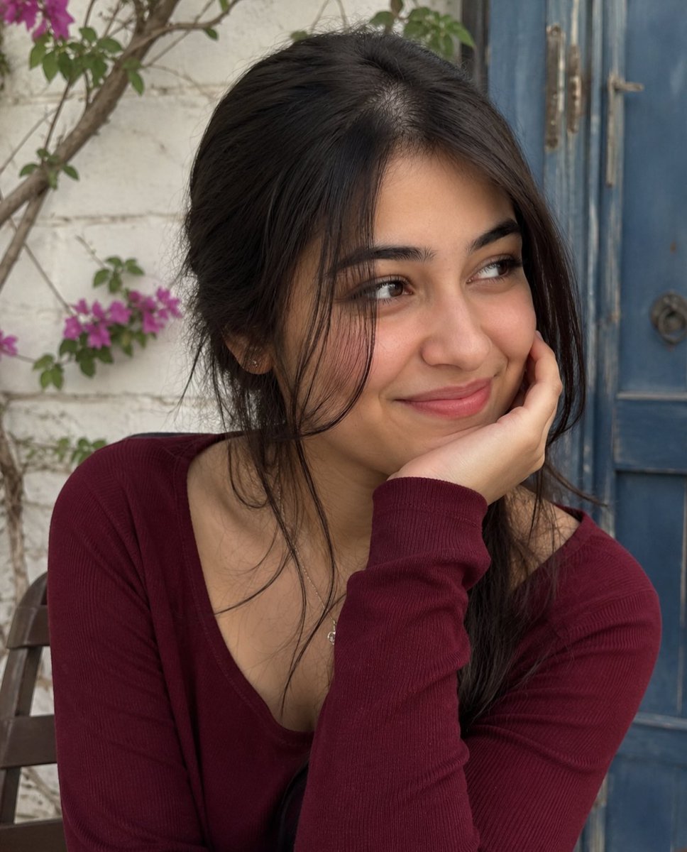 A candid, high-fidelity portrait of a young South Asian woma