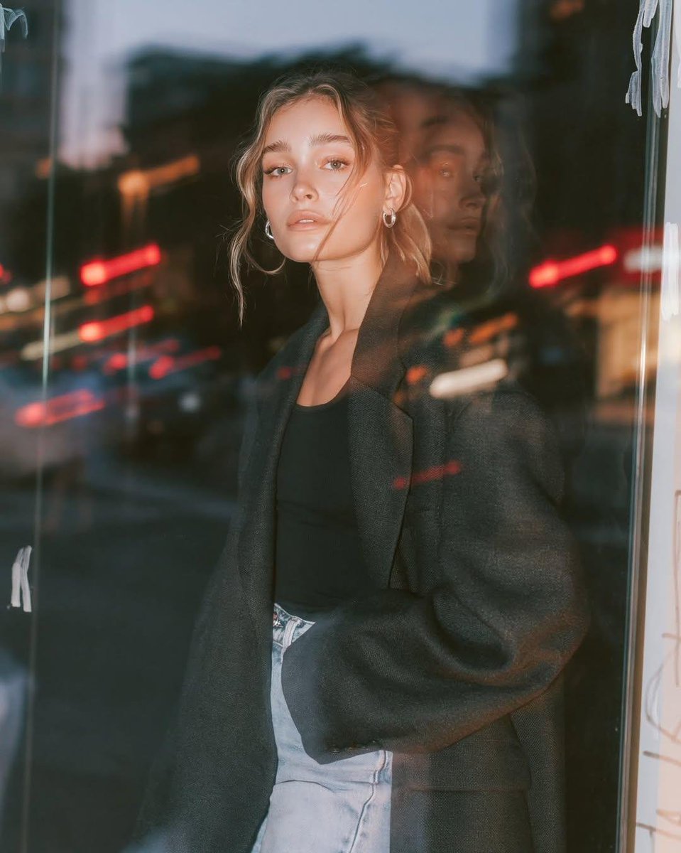 Ultra-realistic editorial fashion portrait of a young woman